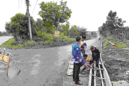 Bupati Kuansing Pacu Terus! Proyek Pengaspalan Jalan di Ibu Kota